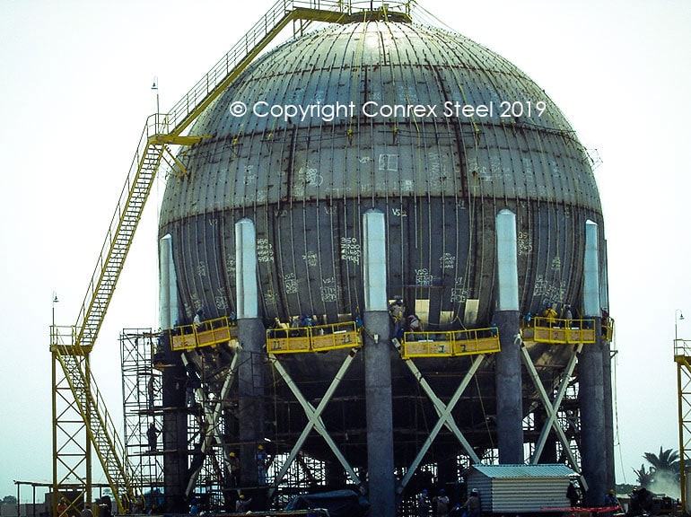 Final sphere assembly in field of legs, stubs, and safety railing